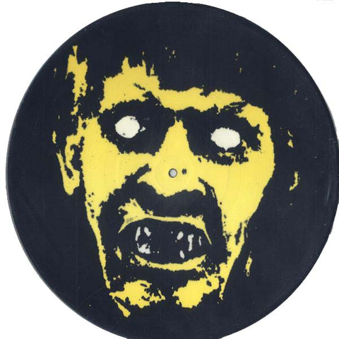 Death Breath - Stinking Up The Night. La pochette montre la tête d'un zombie en jaune sur le fond noir du vinyl.
