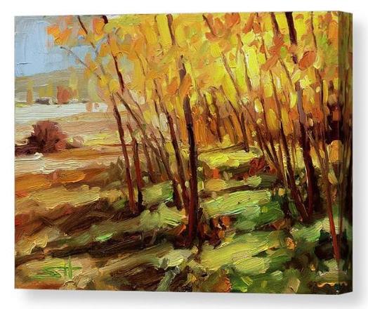 Canvas print of an original oil painting depicting a small copse of trees, turned bright orange in autumn.