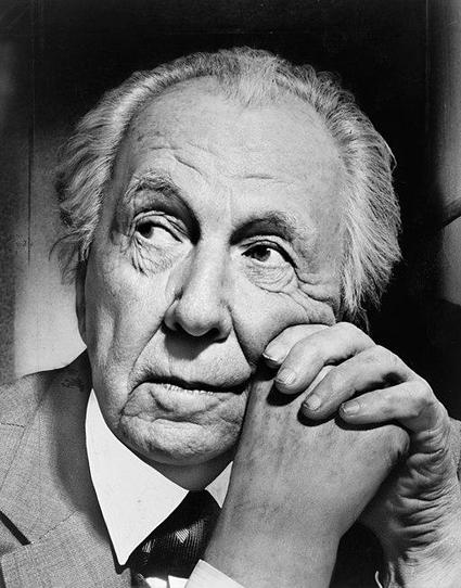Black and white photo of Frank Lloyd Wright.