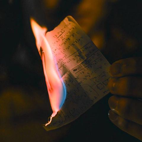 Burning sheet of paper. This image symbolizes the limitations of language and, thus, conceptual thinking, and the liberating act of relinquishing fixed views. Like Nāgārjuna’s method, it reminds us that true clarity arises not by adding more words, but by letting them go. Source: Bakir Custovicꜛ on Unsplashꜛ (license: Unsplash Licenseꜛ).
