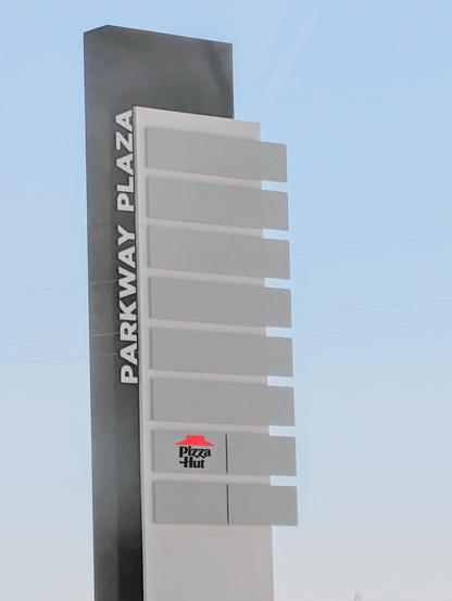 The kind of shopping plaza sign you see from the freeway, showing logos of all the stores you can find in the plaza, but the only store they have is a lonely :Pizza Hut:

The Franchise Wars are being won by Pizza Hut. The Franchise Wars have always been won by Pizza Hut.