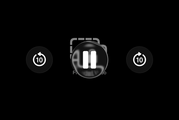 A screenshot of the liquid glass controls over a video that is blacked out due to DRM restrictions. The liquid glass effect simply applies to the DRM blocked content.