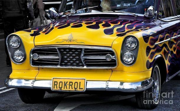 Captured at a vintage car show in Sydney city. There were some wonderful cars. I just love the paint work on this one!
by Kaye Menner Photography
https://kaye-menner.pixels.com/featured/roknrol-kaye-menner.html

THE FINE ART AMERICA LOGO WILL NOT APPEAR ON PURCHASED PRINTS OR PRODUCTS.