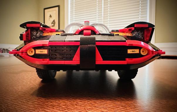 The front grill of the 1966 Lego Batmobile with sloping curves and interconnecting bits of red trim