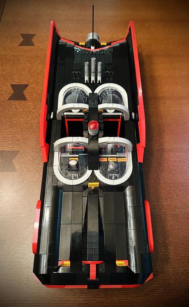 The top view of the 1966 Lego Batmobile, looking down into the cockpit. The long fins on either side swoop down towards the rear end.