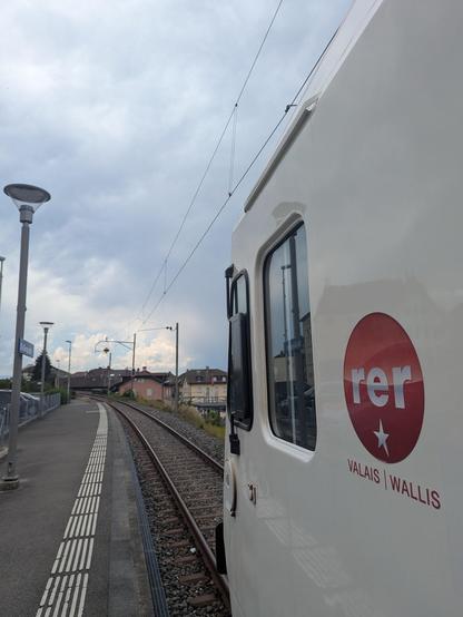 RER Valais logo sur le nez du Domino de RegioAlps en gare de St Gingolph (Suisse).