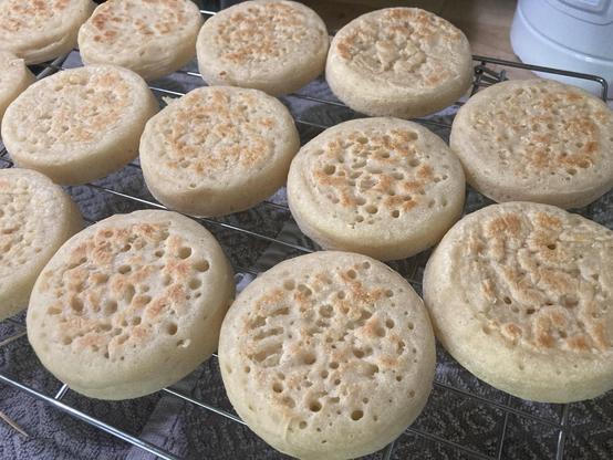 A bunch of homemade crumpets.