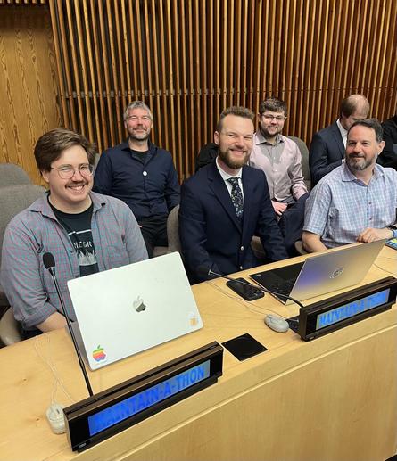 Seth, William Woodruff, and Mike Fiedler with other maintainers at the UN Open Source Maintain-a-thon