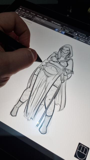 Close up of hand drawing on digital display. Drawing of a female dressed as Skeletor