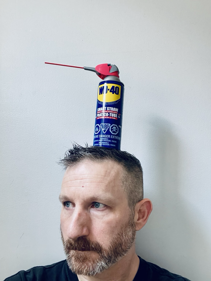 Self-portrait with WD-40. 