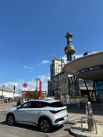 Car in front of buildings