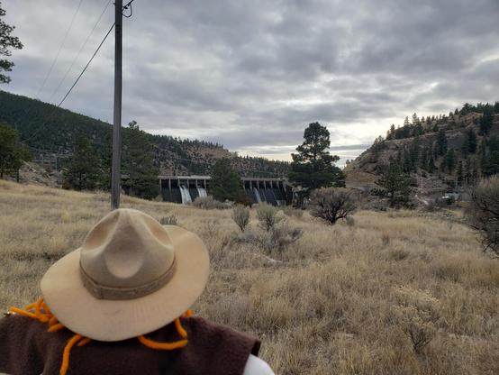 Ranger Sarah looks at Hauser Dam, watching it release water over two spillways.
— at Helena-Lewis and Clark National Forest
