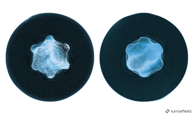X-ray image showing a side-by-side comparison of Torx and Torx Plus screw heads. The Torx head has pointier points than the Torx Plus, which has almost flat points. Image by Lumafield.