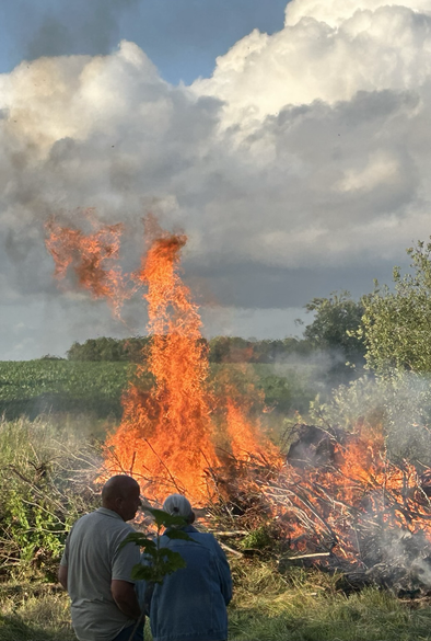 Sankthans bonfire in an open yard