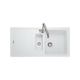 Modern stainless steel undermount kitchen sink with a single deep basin.