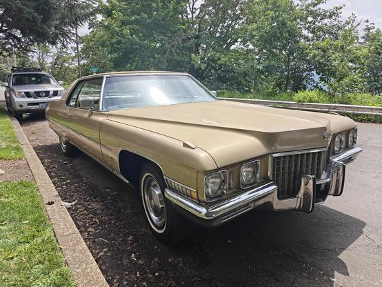 Gold Cadillac El Dorado