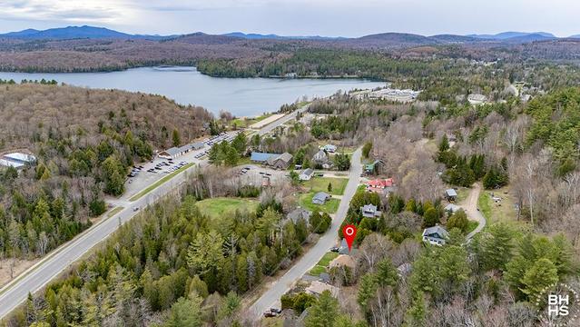 PRICE IMPROVEMENT!
SARANAC LAKE HOME ON OLD LAKE COLBY
Aerial To Lake Colby