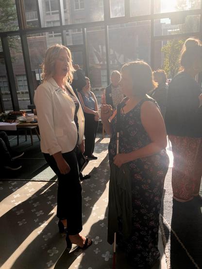 Cynde Vaughn, Aftersight Board President, and Alison Butler with the Colorado Disability Opportunity Office chat after the awards.