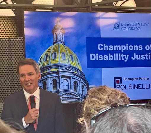 Andrew Romanoff, Executive Director of Disability Law Colorado, begins the awards ceremony.