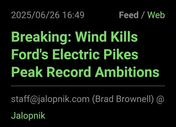 A Jalopnik headline: "Breaking: Wind Kills Ford's Electric Pikes Peak Revord Ambitions"