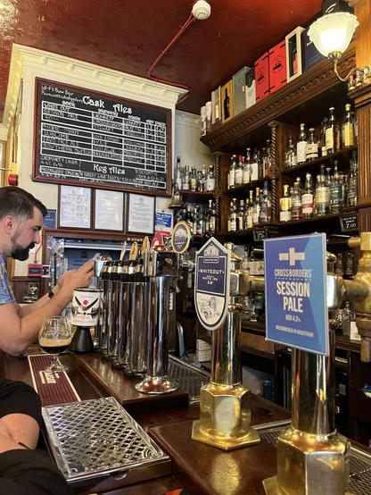 Taps and scotch bottles at the Bow Bar
