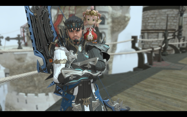 Screenshot of FFXIV depicting a gpose shot of our hero and the Nanamo minion on his shoulder. 