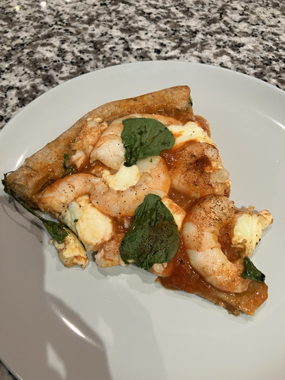 Picture of sliced shrimp pizza