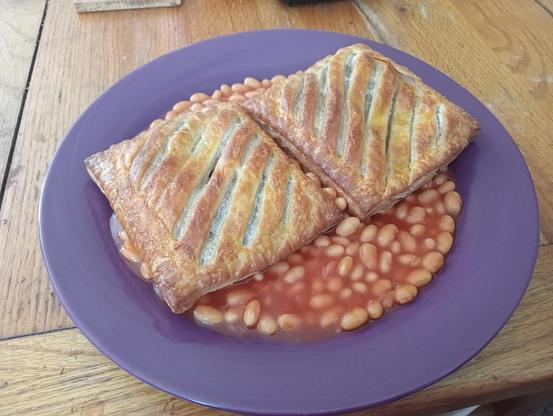 2 Greggs Steak Bakes and a tin of Heinz Baked Beans