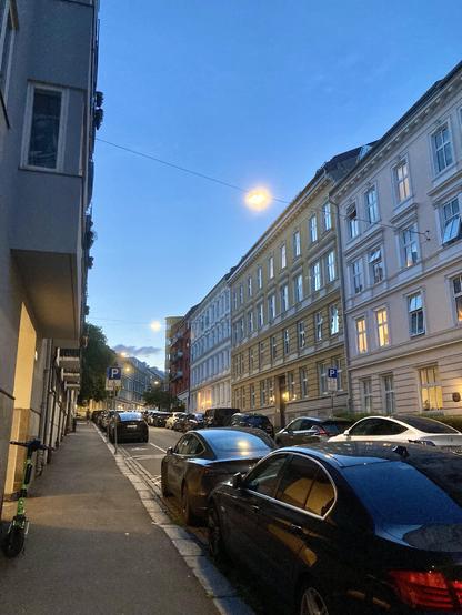 A city street in Norway at midnight in June. Still plenty of daylight and blue sky.