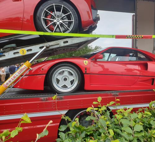 A car transporter containing a Ferrari F40 and, I don't know, an F12, Roma or 812 Superfast? At Banbridge, Northern Ireland.