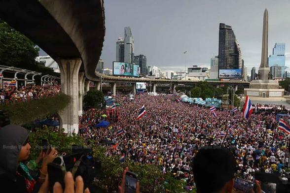 Bangkok Post photo credited to Nutthawat Wichiean: Demonstrators fill the Victory Monument in Bangkok on Saturday, estimated by Thai police to number in the tens of thousands.
