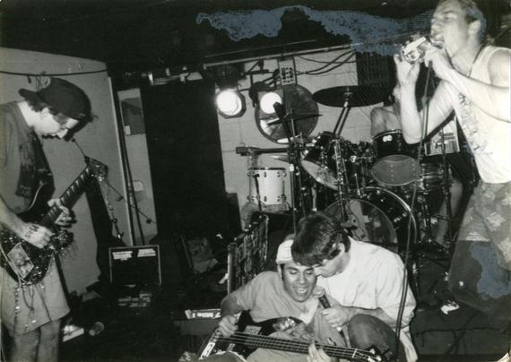 A crazy punk band playing in some venue. 