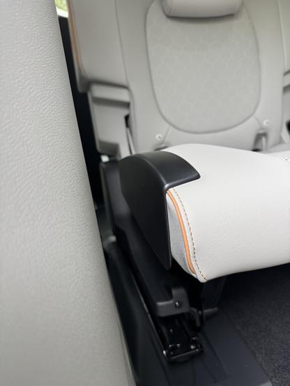 Photograph of black plastic trim added to rear seats in ID.Buzz
