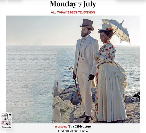 A poorly retouched image of two people on a cliff by the sea, with someone erased from the photo and replaced by copy-pasted water.