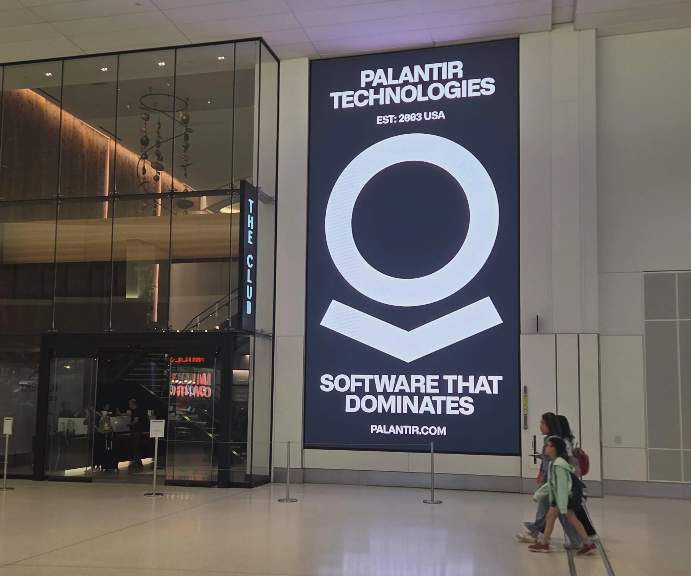 Sign in an airport in San Francisco:

"Palantir Technologies

Est. 2003 USA

Software that dominates

Palantir.com"