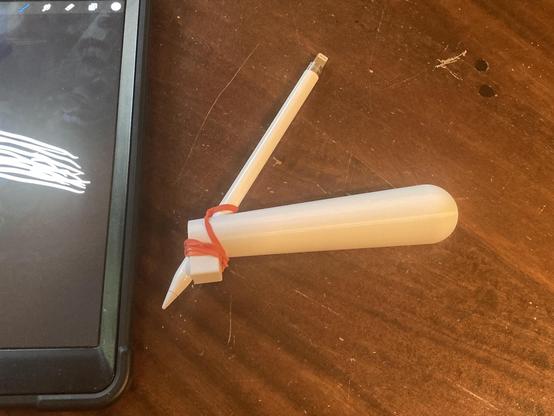A 3D printed tool to hold an Apple Pencil.