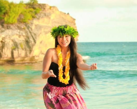 Beautiful Island Women on the beach dancing 