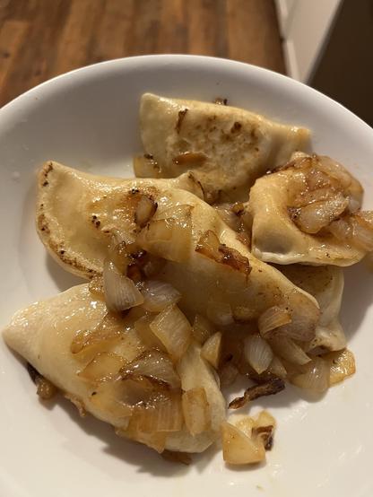 Pierogis cooked with caramelized onions 