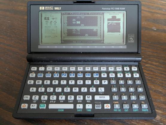 The Chambers Beneath running on a Hewlett Packard 100LX pocket computer. The text prompt reads "You feel terrified."