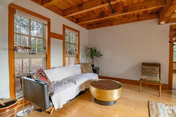 PRICE IMPROVEMENT
ESSEX HOME NESTLED IN THE WOODS
Living Room