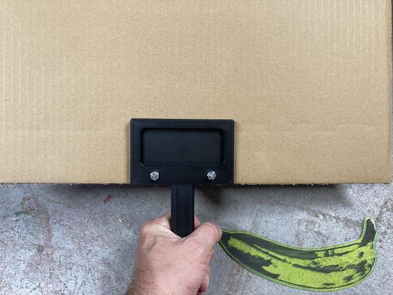 The back piece of a 3D printed sign handle.