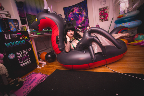 Goth girl on dragon float