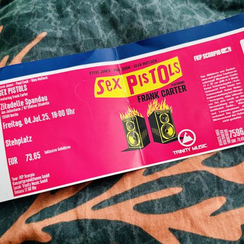Ticket for a concert featuring the Sex Pistols with Frank Carter, scheduled for July 4, 2025, at Zitadelle Spandau, Berlin. The ticket price is €73.65. Design features bold colors and graphics of speakers