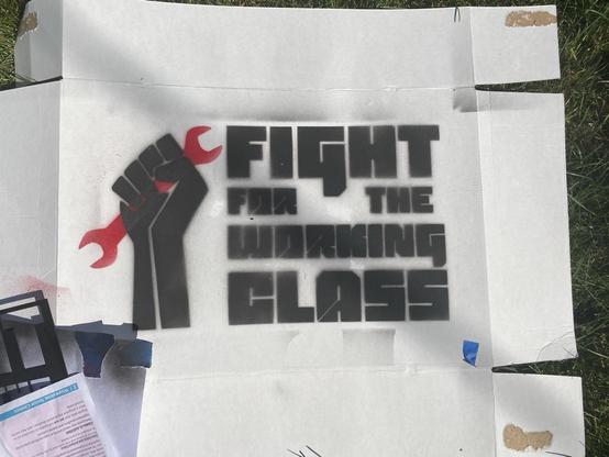 A spray painted sign made with a 3D printed stencil.