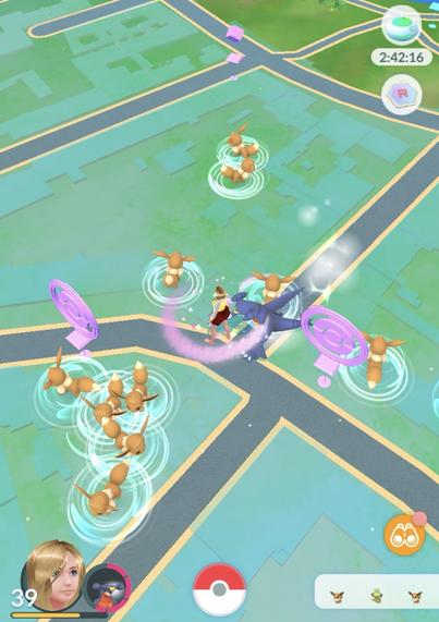 A game interface shows a character surrounded by multiple Eevee Pokémon. There are blue and pink markers on the map, indicating PokéStops or gyms nearby. The player status and timer are also visible in the corner.