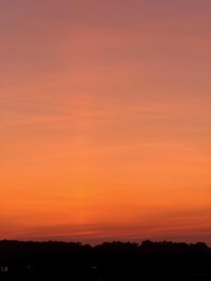 A quite reddish sunset gradient to the horizon