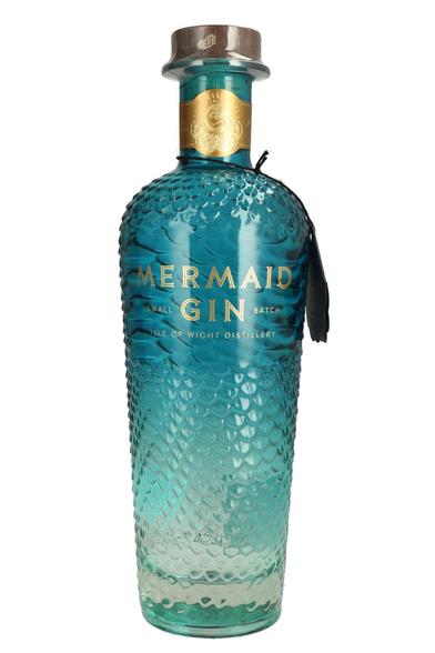 A bottle of Mermaid Gin. The bottle has a teal hue reminiscent of a tropical sea, and a scale pattern reminiscent of fish scales.