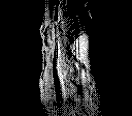 Something that looks like tree bark splitting the darkness vertically. It lookw very organic while it is not (stone)