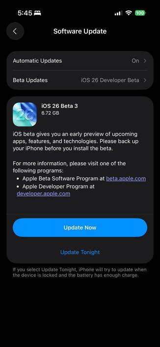 Screenshot of the “Software Update” screen on an iPhone showing the availability of iOS 26 Beta 3. The update is 6.72 GB in size. The text explains that the iOS beta provides an early preview of upcoming apps, features, and technologies, and recommends backing up the device before installation. Links are provided for the Apple Beta Software Program (beta.apple.com) and the Apple Developer Program (developer.apple.com). At the bottom, two update options are shown: “Update Now” and “Update Tonight.” The time displayed is 5:45, with a full battery (100%) and active Wi-Fi connection.