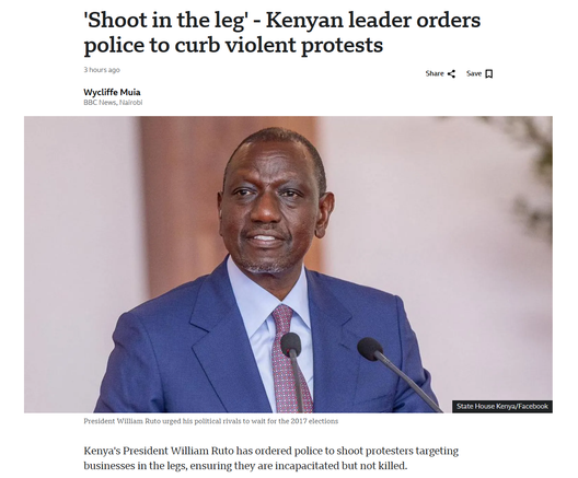 The image is a screenshot of a news article from BBC News, featuring a man in a blue suit and red patterned tie standing at a podium with two microphones. The headline reads, "Shoot in the leg - Kenyan leader orders police to curb violent protests." The subheading states, "Kenya's President William Ruto has ordered police to shoot protesters targeting businesses in the legs, ensuring they are incapacitated but not killed." The article is authored by Wycliffe Muia and is dated 3 hours ago. The source is credited to State House Kenya/Facebook. The man appears to be speaking, with a serious expression, and the background is blurred, focusing attention on him.